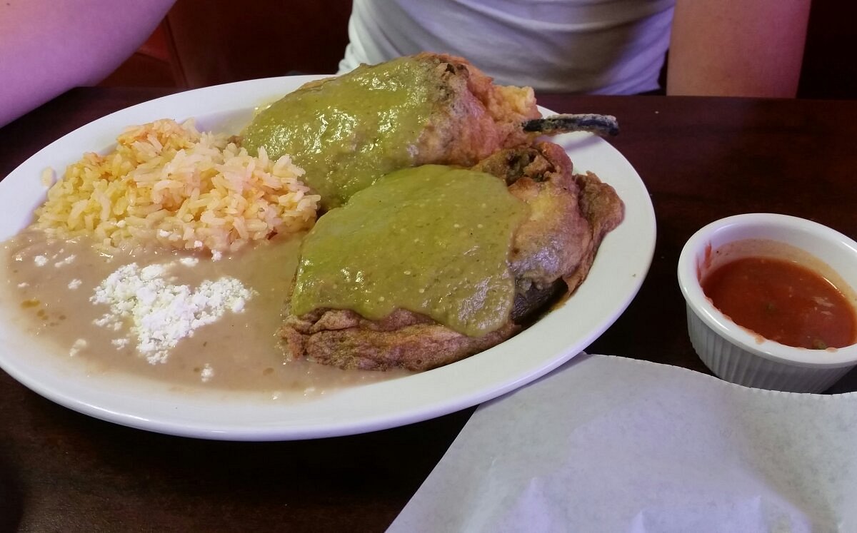 Molcajetes Restaurant signature dishes Chile RellenosSour Cream Chicken EnchiladasCaldo De Camaron
